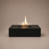 Tenderflame Daisy Tischfeuer aus Natural Concrete in Schwarz